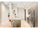 Well-appointed kitchen with granite countertops, stainless steel appliances, and modern cabinetry at 3198 Blake St # 402, Denver, CO 80205