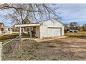 Detached one car garage with an attached covered outdoor living area at 5300 Balsam St, Arvada, CO 80002