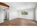 Bright and spacious bedroom with wood floors and large window for natural light at 1801 Buttercup Rd, Elizabeth, CO 80107