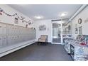 Community lobby with seating and mailboxes at 3022 S Wheeling Way # 107, Aurora, CO 80014
