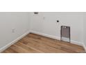 Clean and functional laundry room featuring hookups and neutral flooring at 19110 E 96Th Pl, Commerce City, CO 80022