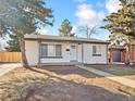 Charming single-story home with a well-maintained front yard and inviting entrance at 1475 S Eaton St, Lakewood, CO 80232