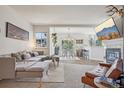 Inviting living area with sectional sofa, open floor plan, and natural light at 6850 Xavier Cir # 5, Westminster, CO 80030