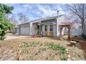 Cozy single Gathering home with a two car garage and well-kept front yard landscaping at 1834 Hennington Ct, Longmont, CO 80501
