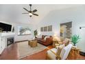 Bright living room featuring neutral decor, hardwood floors, and modern furniture at 13504 Pecos St, Westminster, CO 80234