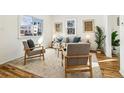 Sun-filled living room with comfortable seating and stylish decor at 1665 Boston St, Aurora, CO 80010