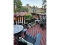 Cozy outdoor living area with a table, chairs, plants, and decorative features at 6504 Ralston Rd # A, Arvada, CO 80002