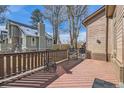 Well-maintained wooden deck with railing, offering a private outdoor space at 6504 Ralston Rd # A, Arvada, CO 80002