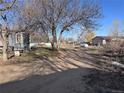 Property lot with shed in the background at 7486 Patrick St, Fort Lupton, CO 80621