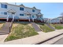 Charming townhomes feature well-kept lawns, inviting staircases, and a peaceful neighborhood setting at 4120 E 119Th Pl # B, Thornton, CO 80233