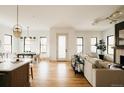 Bright, open-concept living area with hardwood floors, lots of natural light and modern decor at 1016 28Th St, Denver, CO 80205