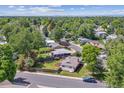 Beautiful home in a lush, green neighborhood with mature trees, and fenced-in yards at 1420 S Leyden St, Denver, CO 80224