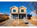 Charming two-story duplex featuring light wood and grey facade and inviting front steps at 4341 N Columbine St, Denver, CO 80216