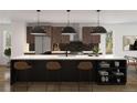 Spacious kitchen with large island, stainless steel appliances, and stylish pendant lighting at 4201 Wyandot St, Denver, CO 80211