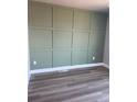 A board and batten wall offers architectural detailing and visual interest at 2140 S Ash St # 103, Denver, CO 80222