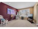 Comfortable living room with shutters on the window and recessed lighting at 19197 E Progress Ave, Centennial, CO 80015