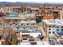 Panoramic aerial view of the neighborhood showcasing surrounding buildings and distant mountains at 2640 Central Ct # 204, Denver, CO 80211