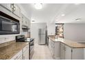 Bright kitchen with stainless steel appliances and granite countertops at 1625 Larimer St # 1001, Denver, CO 80202