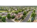 Desirable neighborhood showcasing homes with mature trees and green spaces with walking trails in this picturesque aerial view at 20964 E Greenwood Pl, Aurora, CO 80013