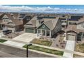 Residential neighborhood with modern homes and mountain views at 8803 S Winnipeg Ct, Aurora, CO 80016