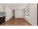 Bright living room featuring hardwood floors and natural light at 2702 Atchison St, Aurora, CO 80011
