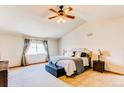 Spacious main bedroom features vaulted ceilings and plush carpeting at 1678 S Parkdale Cir, Erie, CO 80516