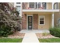 Inviting front entrance with a decorative wreath and manicured landscaping at 524 E Hinsdale Ave, Littleton, CO 80122