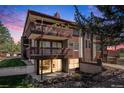 Spacious home with multiple balconies and large windows, showcasing a modern design at 500 Manhattan Dr # B1, Boulder, CO 80303
