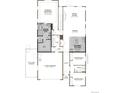 Detailed floor plan showcasing the primary bedroom, gourmet kitchen, and attached two-car garage at 229 Wooten Ave, Brighton, CO 80601