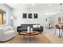 Bright living room featuring neutral colors, modern decor, and an open layout at 2990 S Elm St, Denver, CO 80222