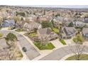 Residential street featuring manicured lawns, mature trees, and well-kept homes in a suburban neighborhood at 2649 S Kline Cir, Lakewood, CO 80227