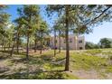 Secluded home on lush lot with mature trees and beautiful landscaping at 17575 Minglewood Trl, Monument, CO 80132