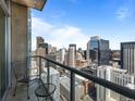 Balcony showcasing a stunning downtown city view from a high-rise building at 891 14Th St # 3411, Denver, CO 80202