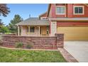 Charming two-story home with a manicured lawn and welcoming curb appeal at 5784 W 81St Cir, Arvada, CO 80003