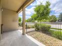 Patio with stone landscaping and views of surrounding greenery at 600 E Dry Creek Pl, Littleton, CO 80122