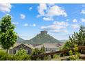 Breathtaking view of a picturesque mountain, enhancing the property's appeal with its natural beauty and serene surroundings at 3344 Evening Pl, Castle Rock, CO 80109
