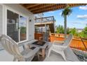 Inviting outdoor patio area with comfortable seating and a cozy ambiance, perfect for relaxing or entertaining guests at 3344 Evening Pl, Castle Rock, CO 80109