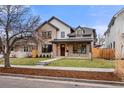 Charming two-story home with a modern design and well-maintained landscaping at 2056 S Ogden St, Denver, CO 80210