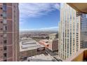 Expansive city view showcasing downtown buildings and distant mountains on a clear day at 1020 15Th St # 23L, Denver, CO 80202