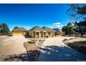 Beautiful ranch-style home with circular driveway and ample parking space at 6936 S Chapparal W Cir, Centennial, CO 80016