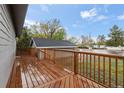This home features a spacious exterior deck, perfect for enjoying the outdoors at 400 Division Blvd, Platteville, CO 80651