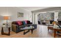 Inviting living room with stylish furniture and a bright balcony view offers a relaxed atmosphere at 800 N Washington St # 307, Denver, CO 80203