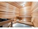 Relaxing cedar wood sauna with bench seating at 1175 Ridge Oaks Dr, Castle Rock, CO 80104