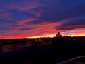 Spectacular sunset view showcasing vibrant colors over the cityscape, offering a picturesque backdrop at 22962 Briar Leaf Ave, Parker, CO 80138
