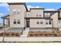 Contemporary two-story home boasting a stylish facade, neatly kept grounds, and a welcoming front entrance at 4755 Memphis St # 2, Denver, CO 80239