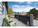 Relaxing deck space with mountain views and peaceful surroundings at 32 Magnum Bonum Dr, Breckenridge, CO 80424