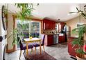 Bright kitchen with stainless steel appliances, dark cabinetry, and mountain views at 32 Magnum Bonum Dr, Breckenridge, CO 80424