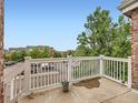 Concrete balcony with white railing overlooking the community at 16366 E Fremont Ave # 11, Aurora, CO 80016