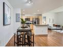Kitchen features a breakfast bar and a dining area with four stools at 3601 Arapahoe Ave # 102, Boulder, CO 80303
