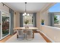 Dining area with lots of natural light and a sliding glass door to the backyard at 10294 Spotted Owl Ct, Highlands Ranch, CO 80129